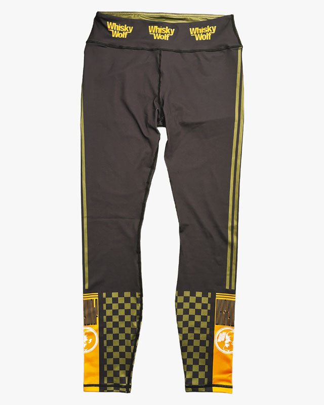 Gym / grappling leggings with yellow and black accents and 'Whisky Wolf' branding. made for jiu jitsu bjj